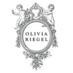 Ornate logo with cherubs and text.